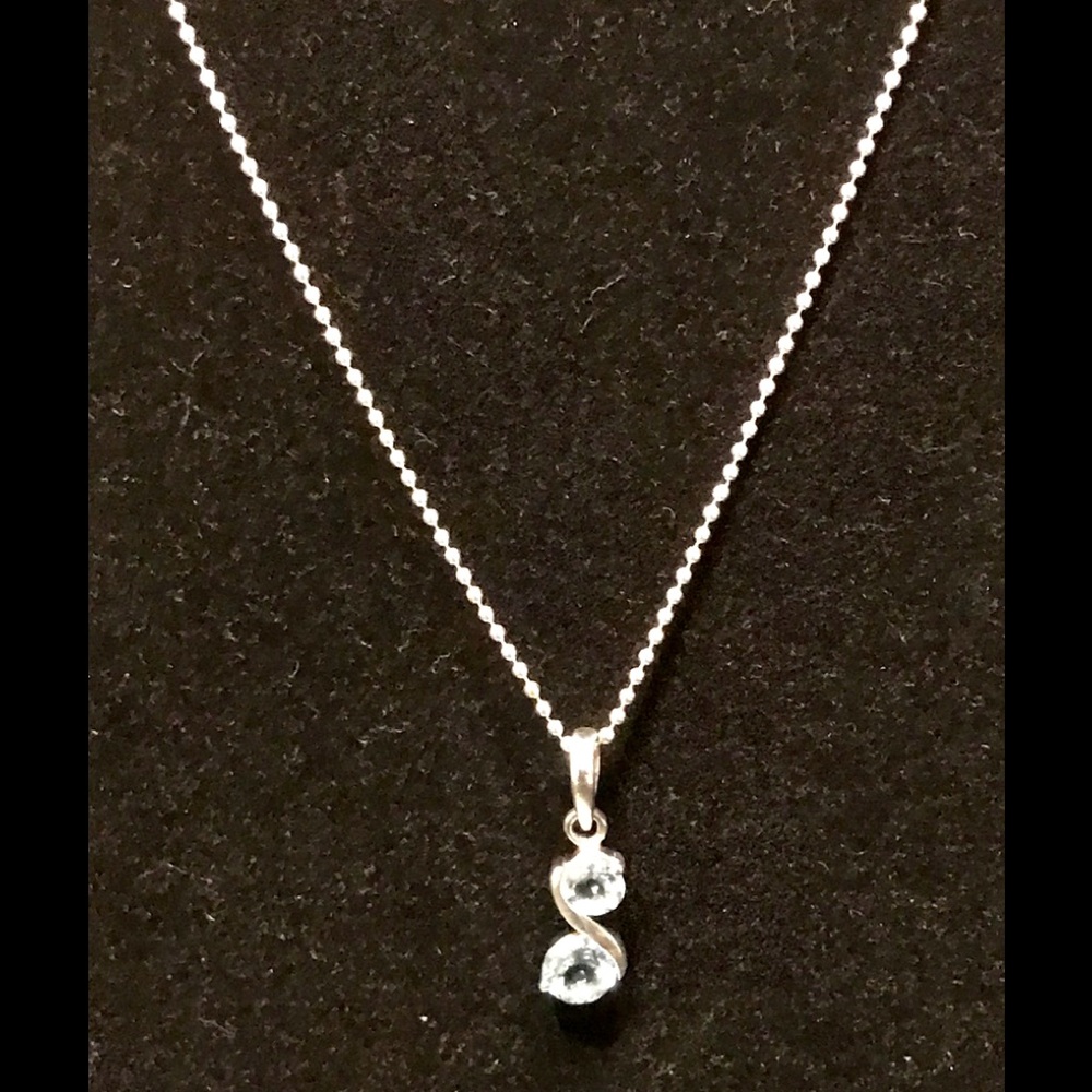 Sterling silver w/blue topaz Twin Souls pendant.